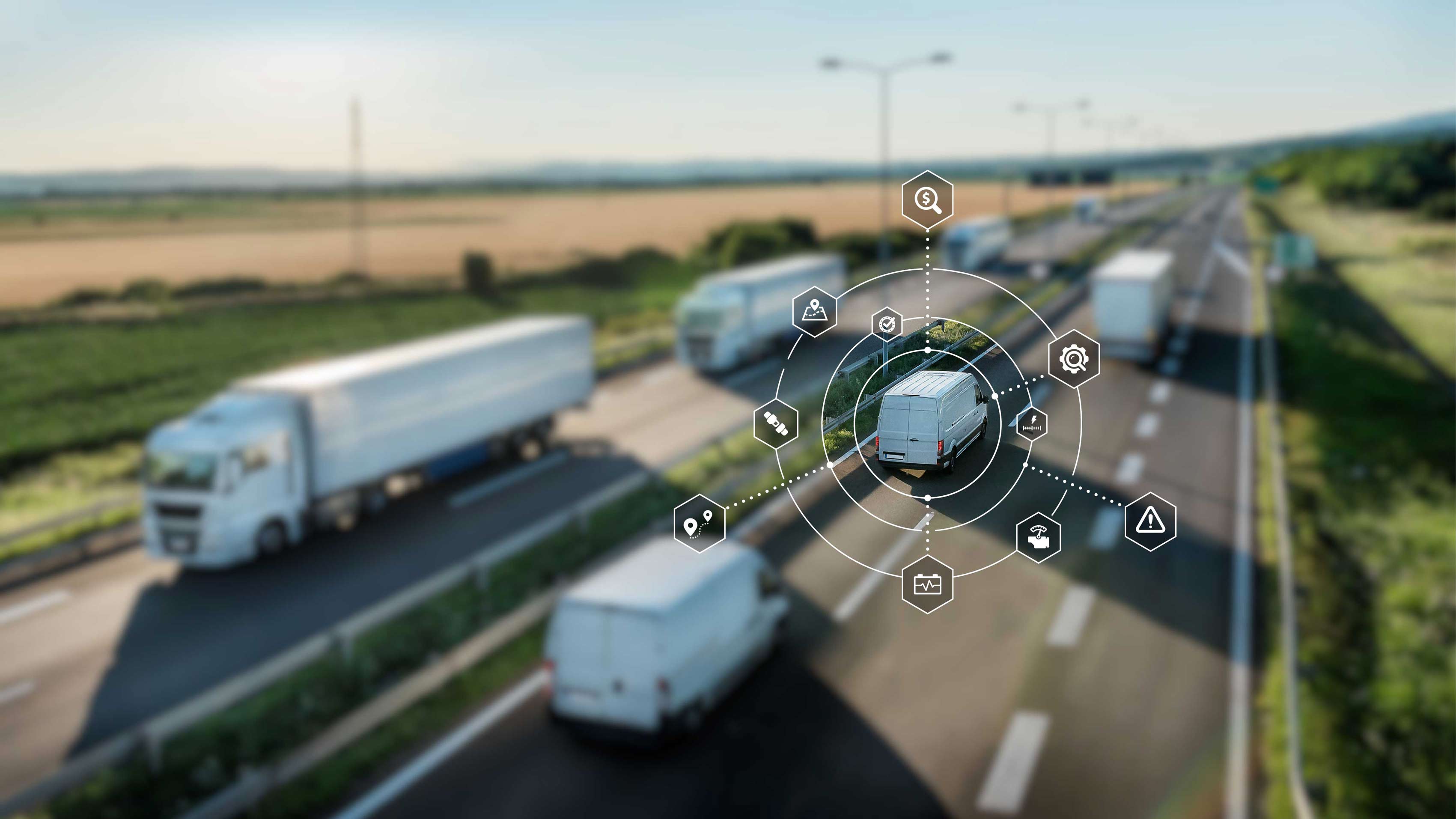 An image of a trucks in the background and graphic design