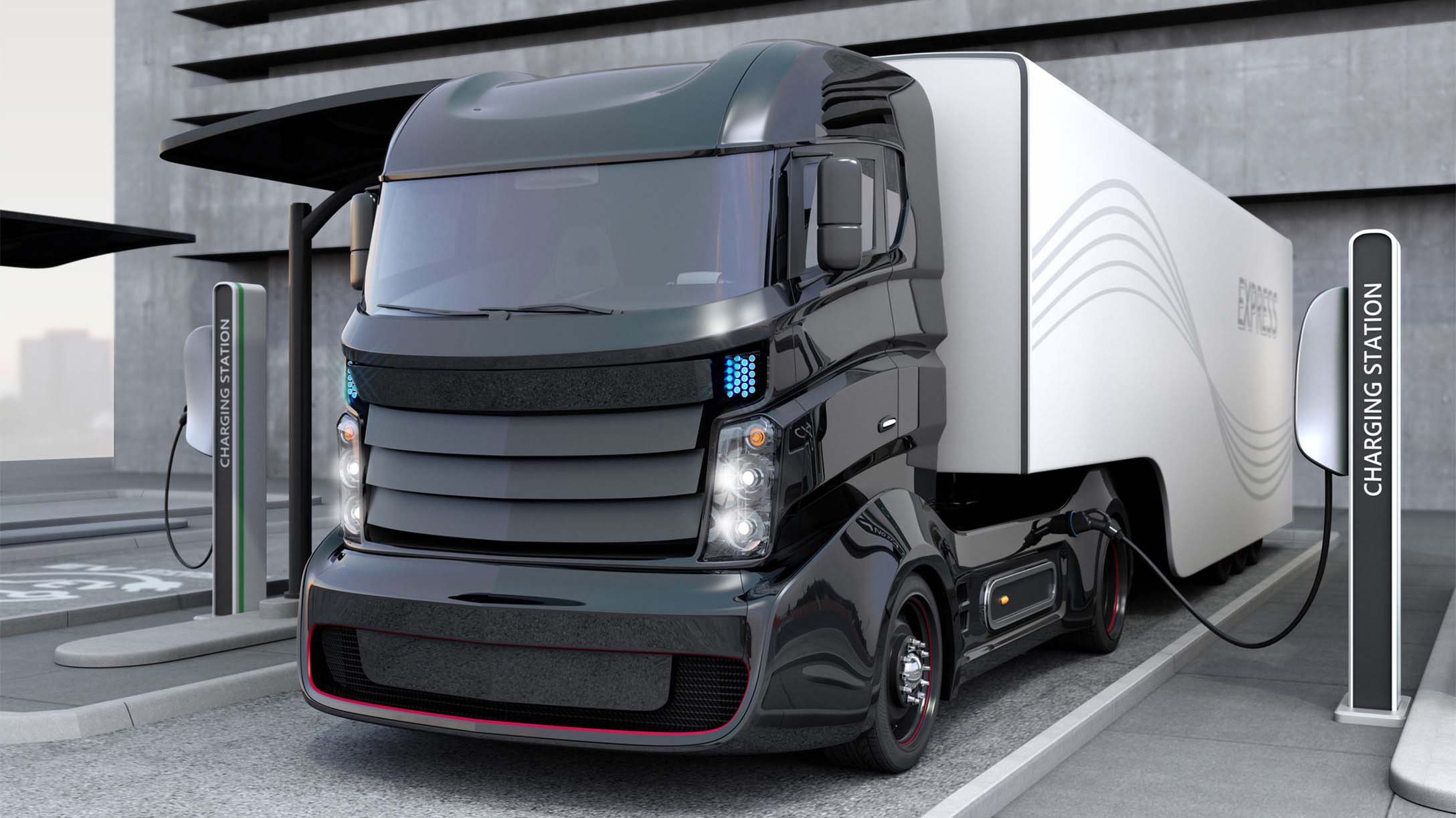Concept image of electric truck parked at a charging station