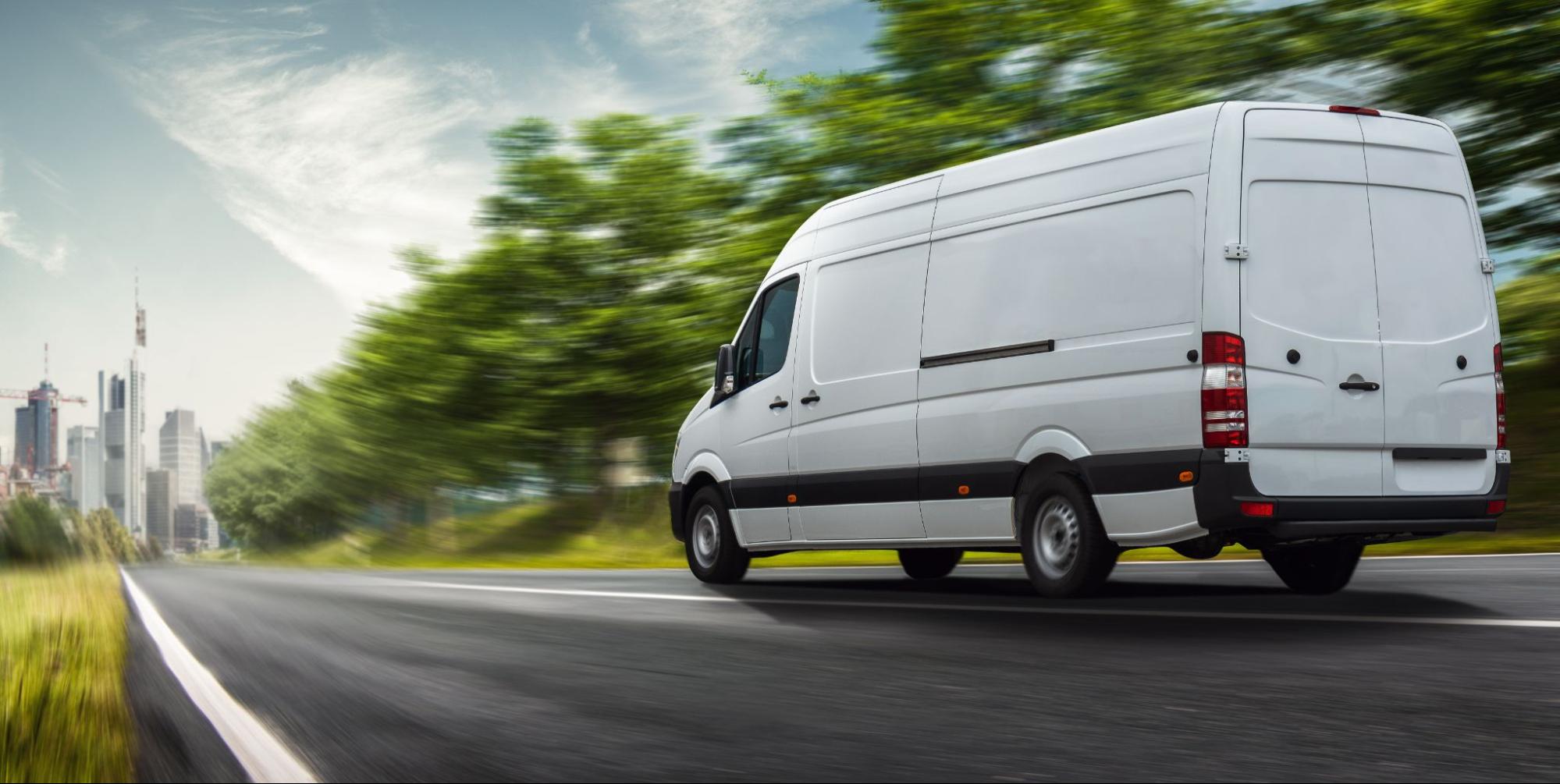 van driving down road