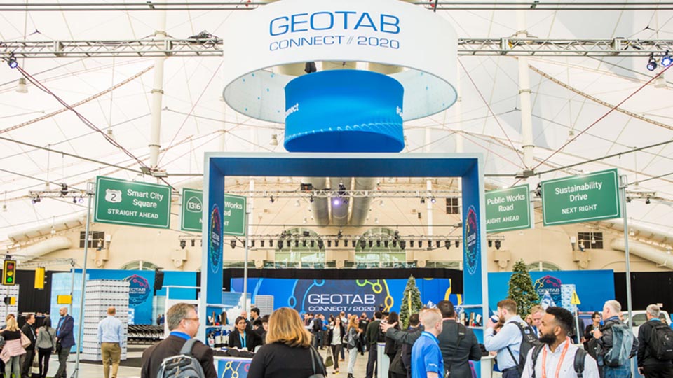 People in front of Geotab booth at Connect 2020