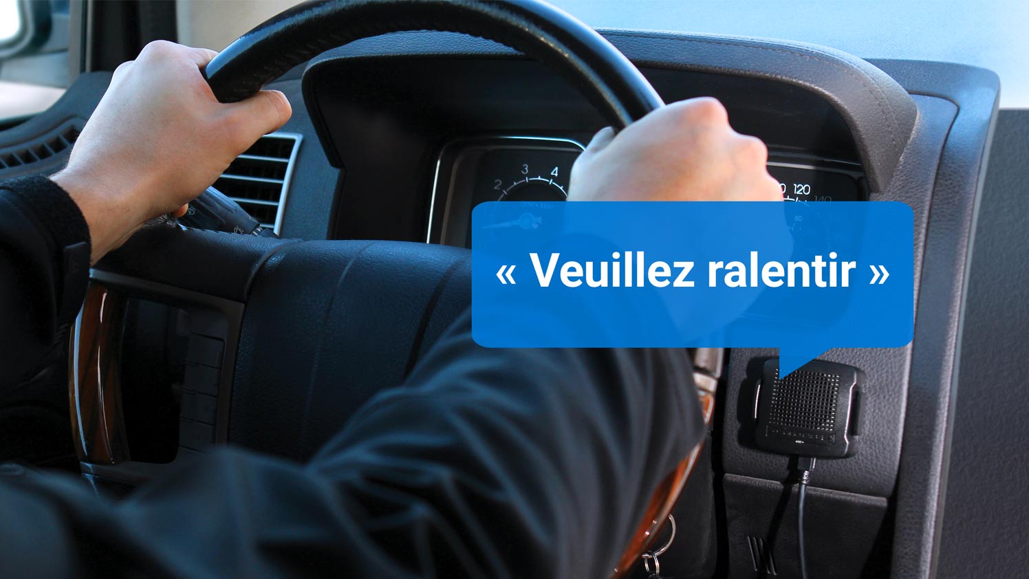 GO TALK rappelle au chauffeur de ralentir dans une bulle bleue.