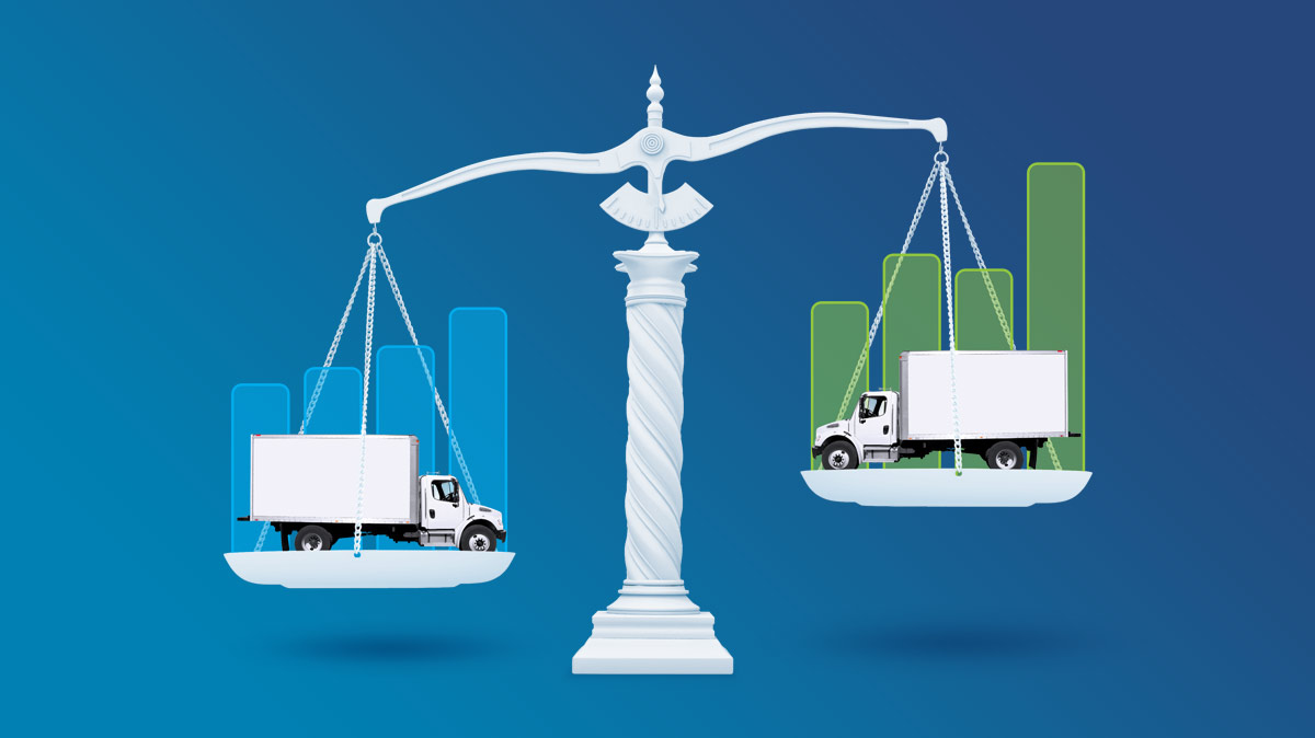Two white commercial trucks balancing on each side of a scale