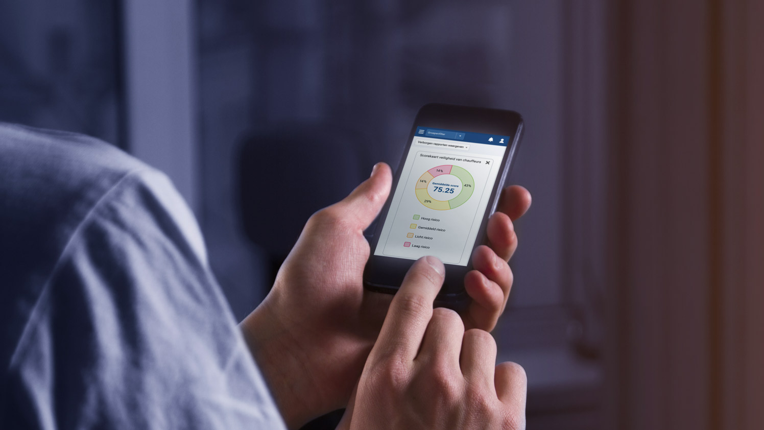Person using mobile phone to check Driver Safety Scorecard in MyGeotab