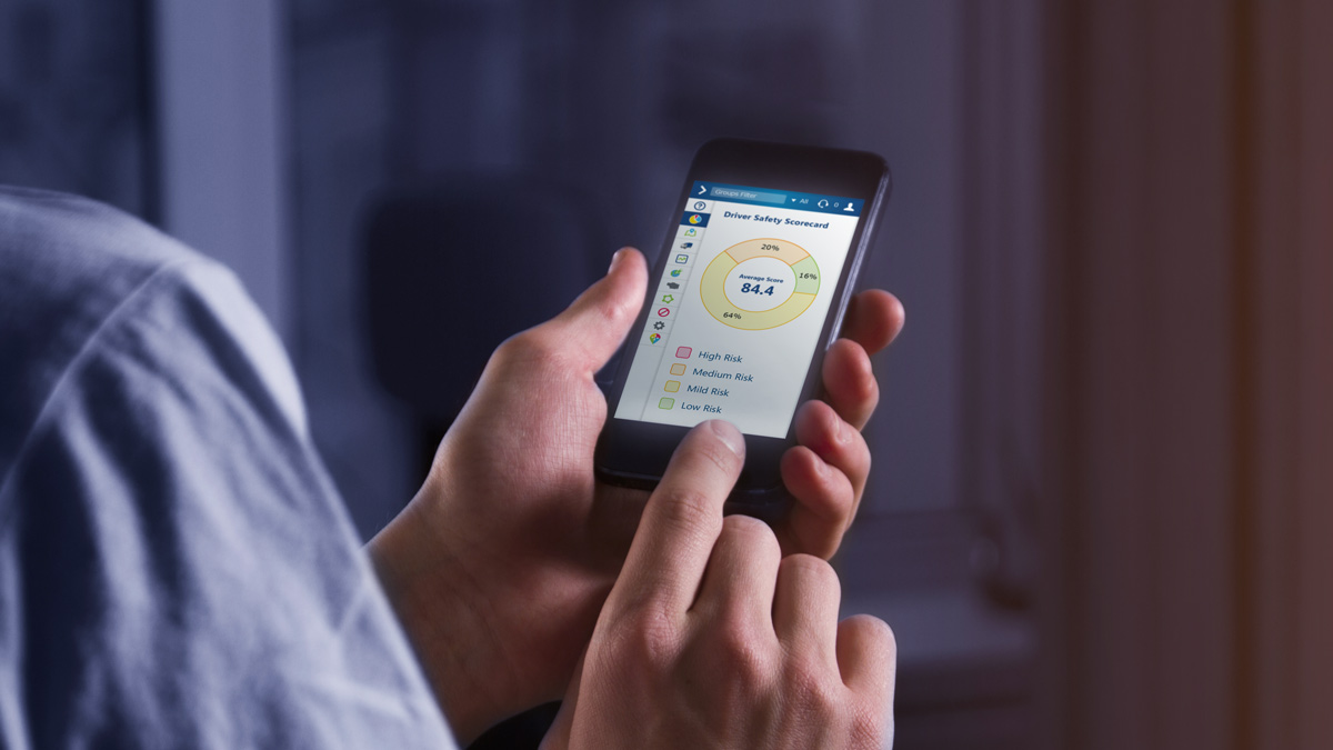 Person using mobile phone to check Driver Safety Scorecard in MyGeotab
