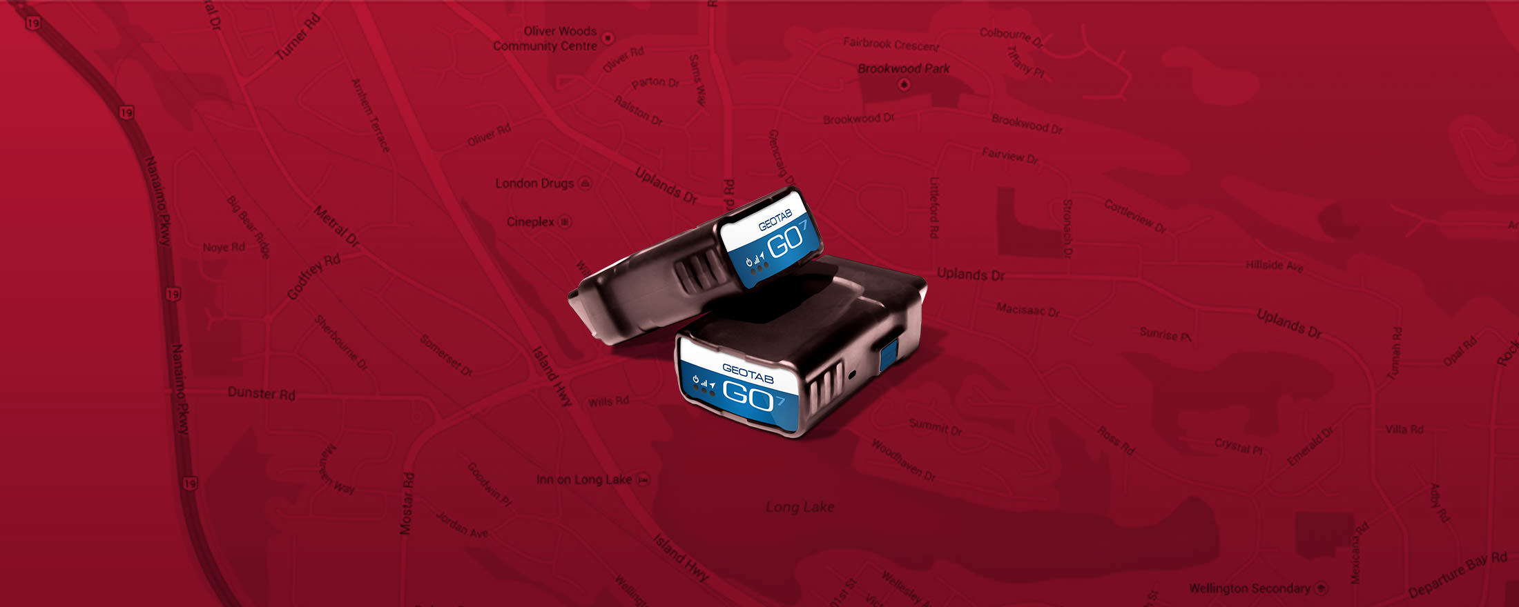 Two Geotab GO Devices on top of a red map