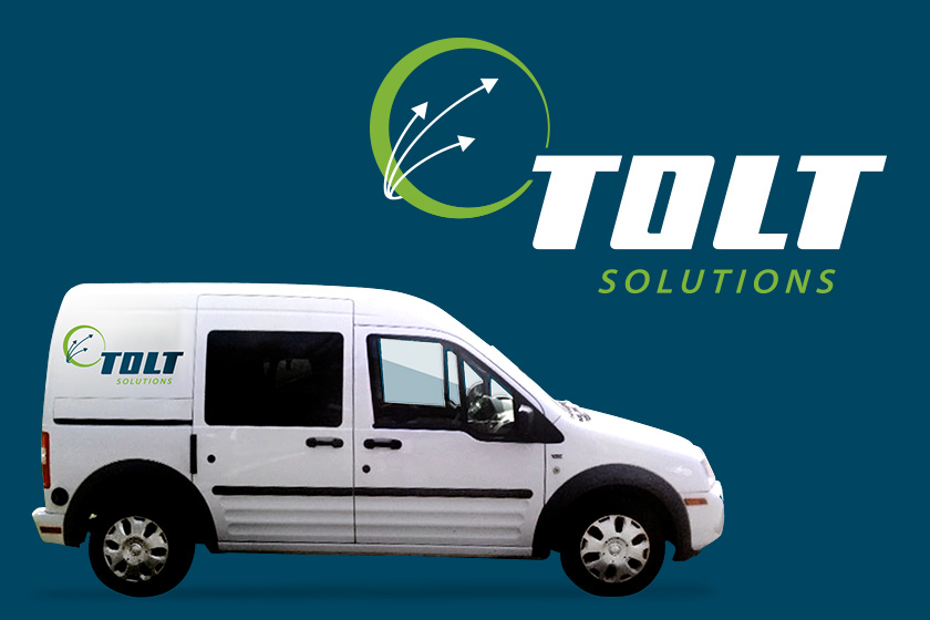 Tolt Solutions van on blue background