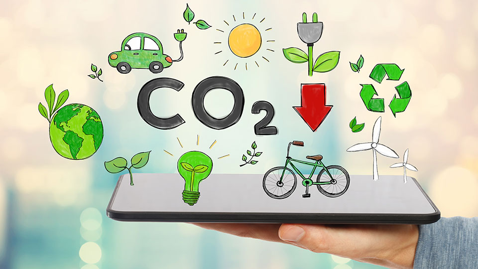 Tablet mit mehreren Symbolen wie CO2, Fahrrad, grüner Planet und mehr. 