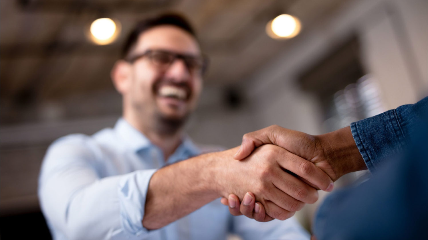 Two people shaking hands