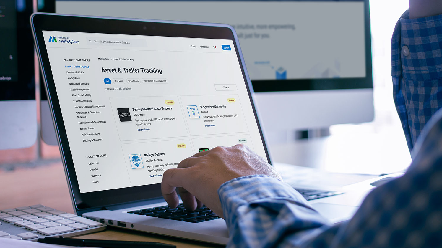 Person using Geotab marketplace on laptop