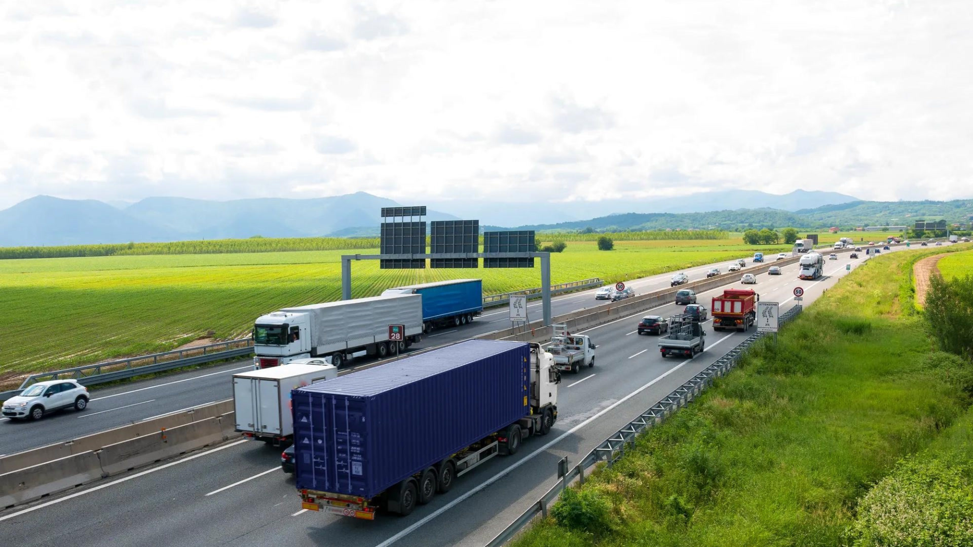cars and trucks on a highway