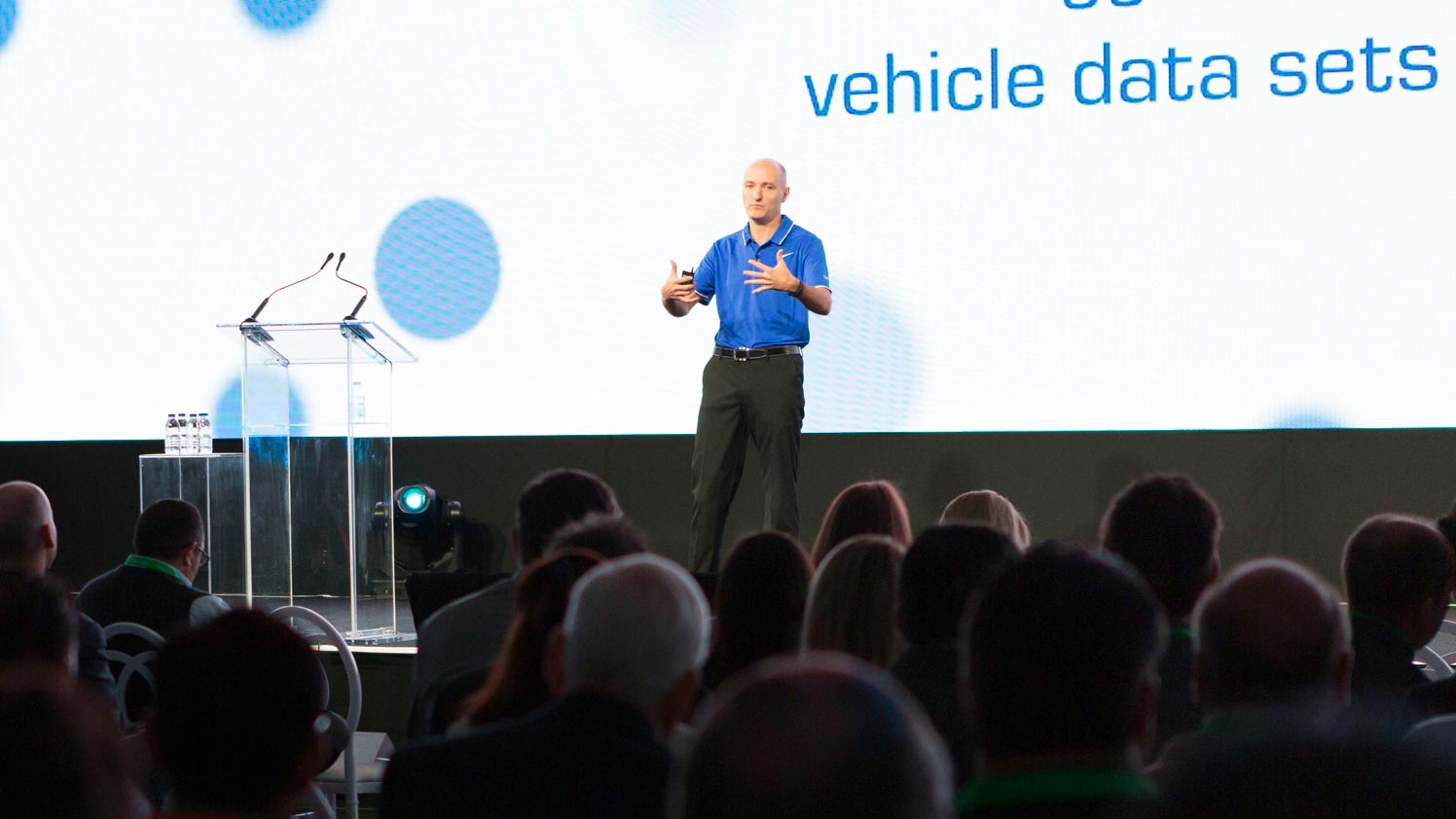 A man presents on stage
