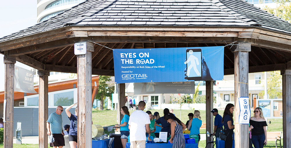 People enjoying the Eyes On The Road Geotab Outdoor Event 