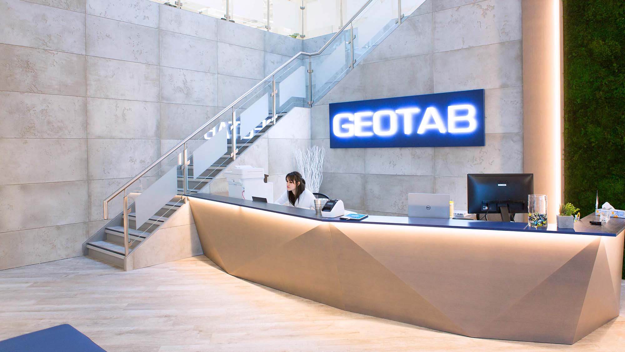 geotab hq reception desk with a receptionist 