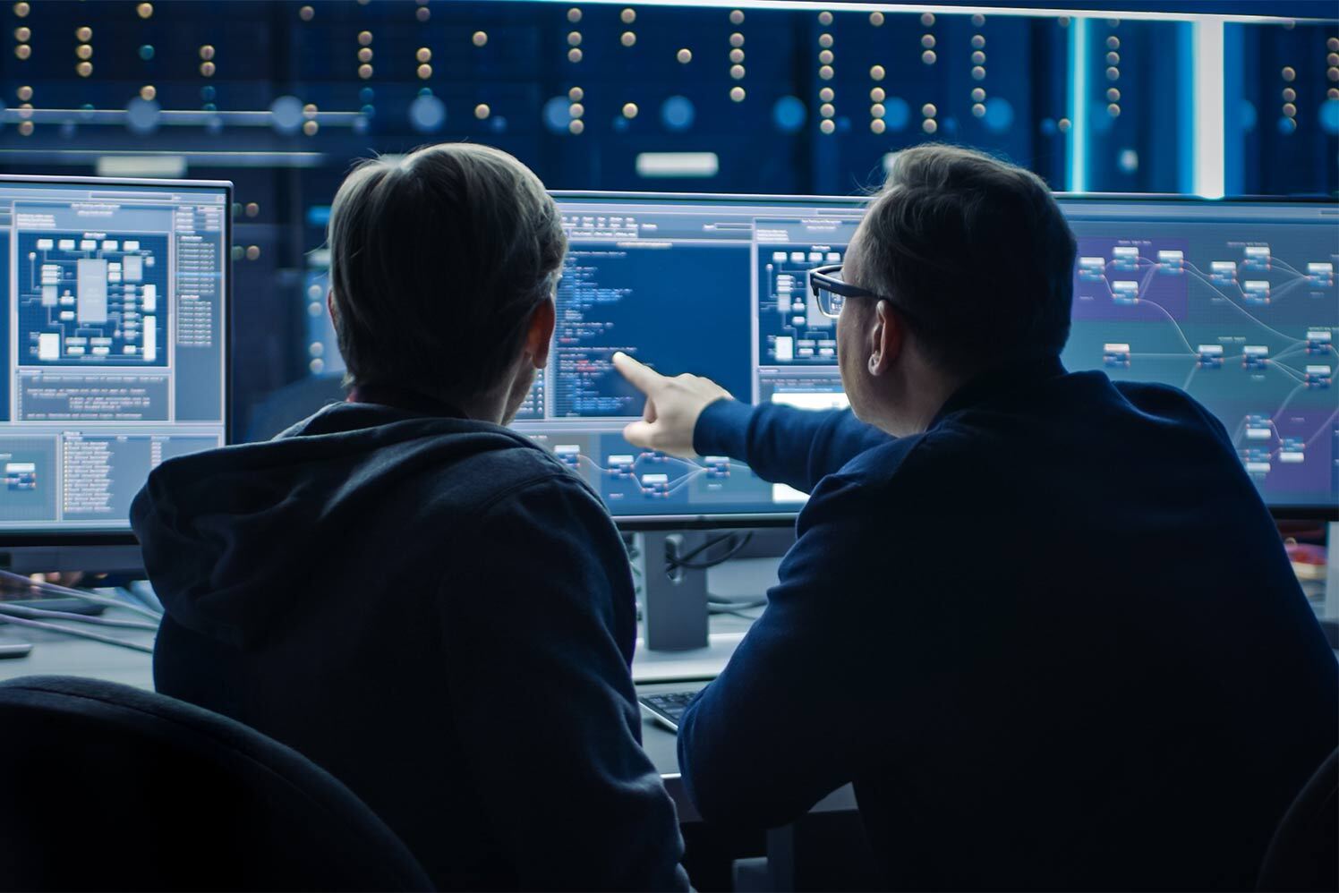 people looking at computer