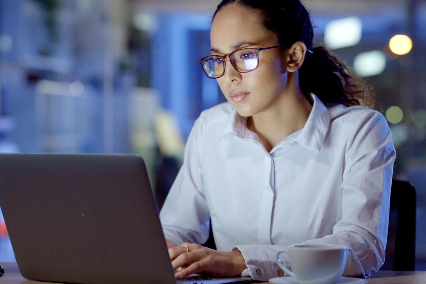 woman looking at laptop