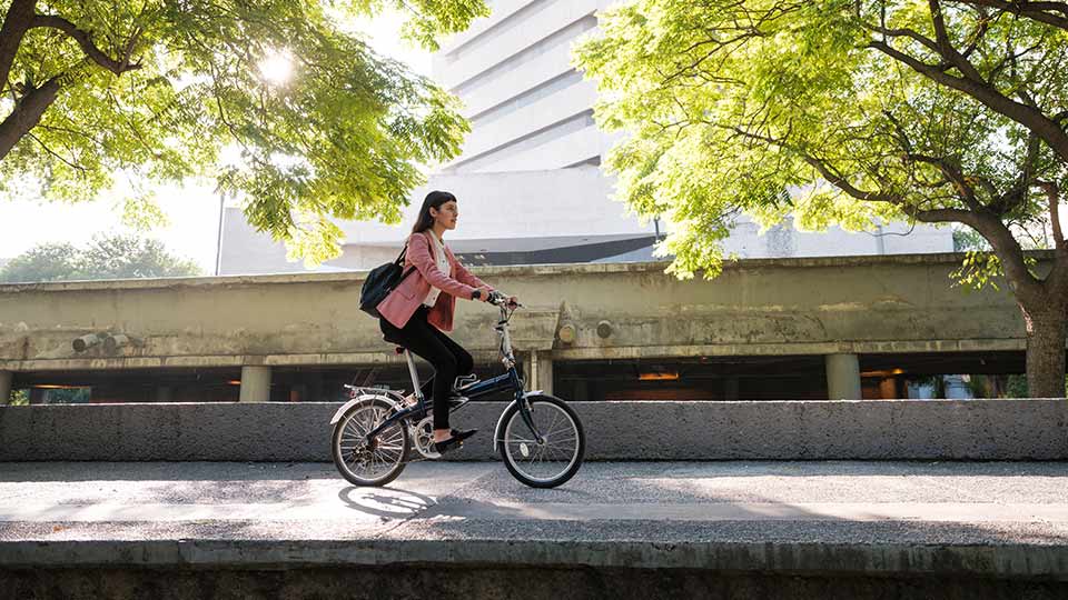 Woman riding a bike in the city