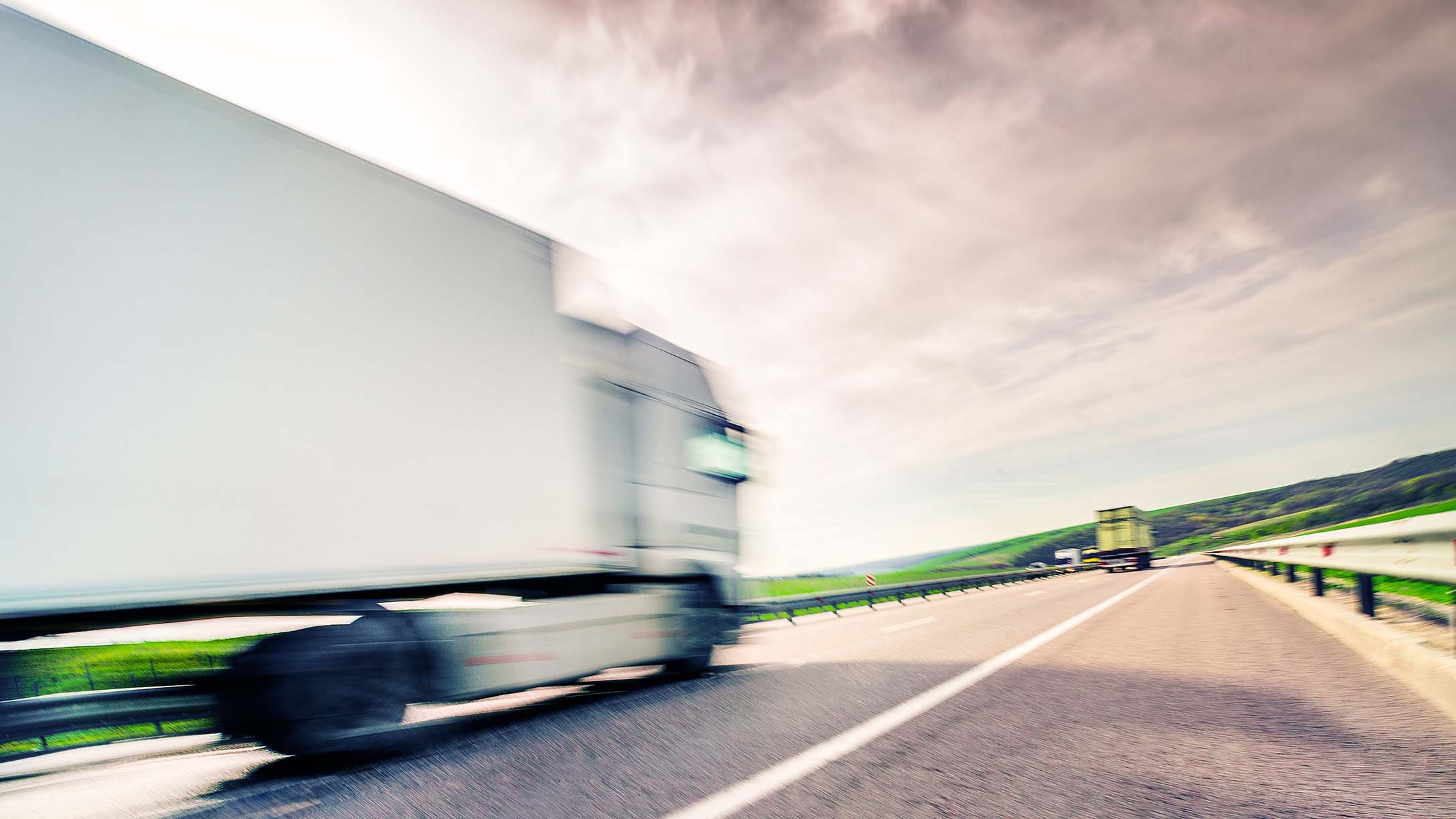 White truck on a freeway