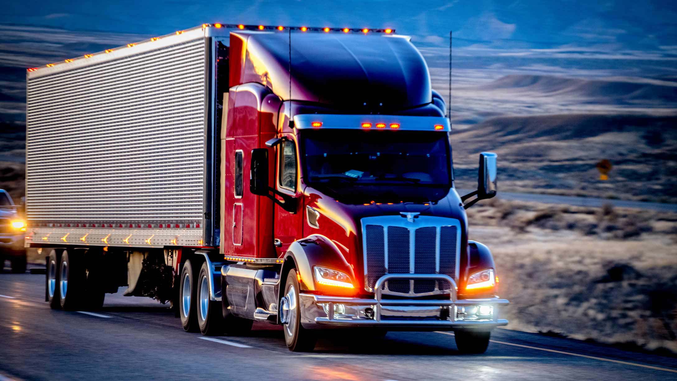 Red heavy truck on a road