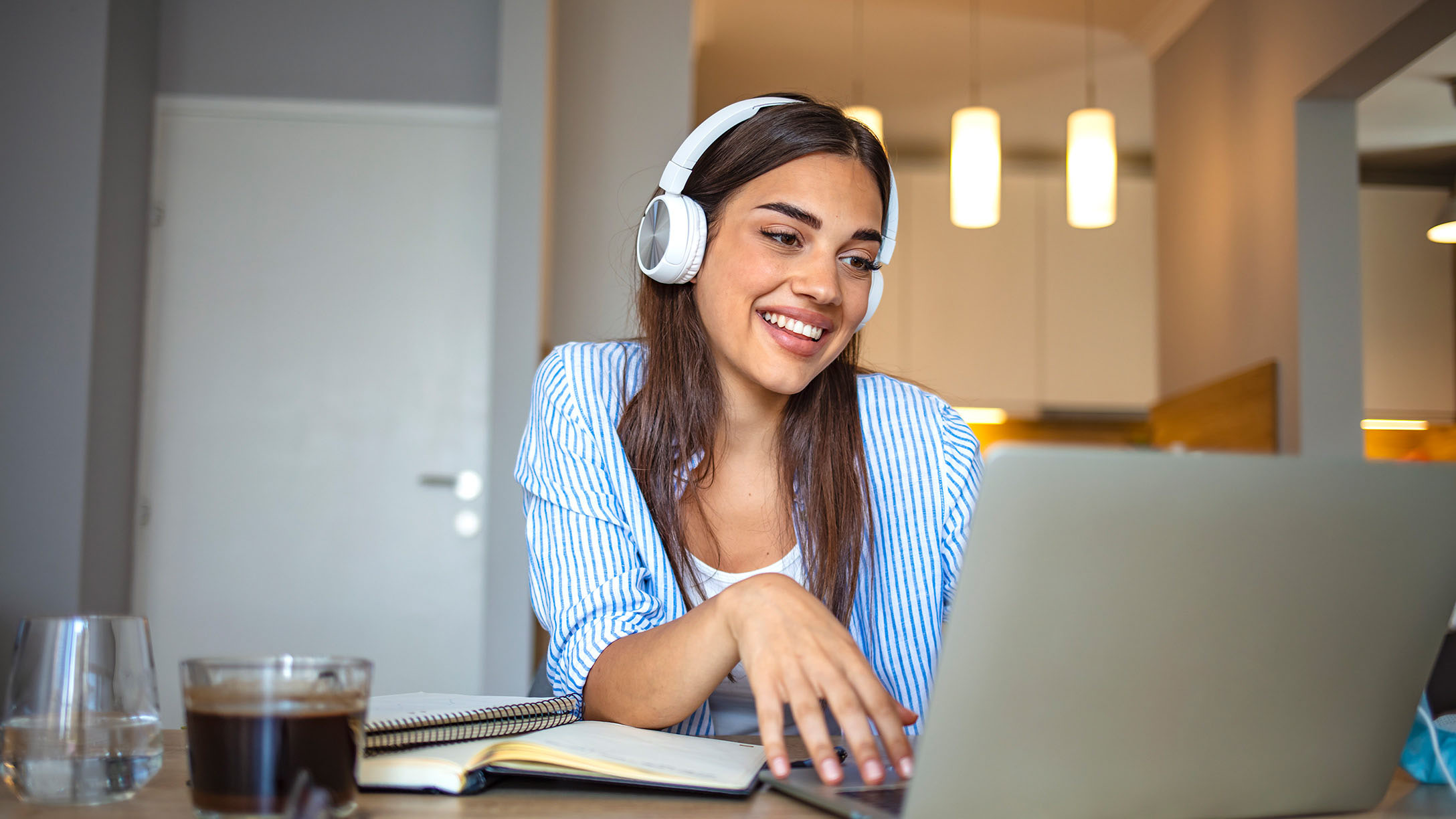 Girl smiling on computer