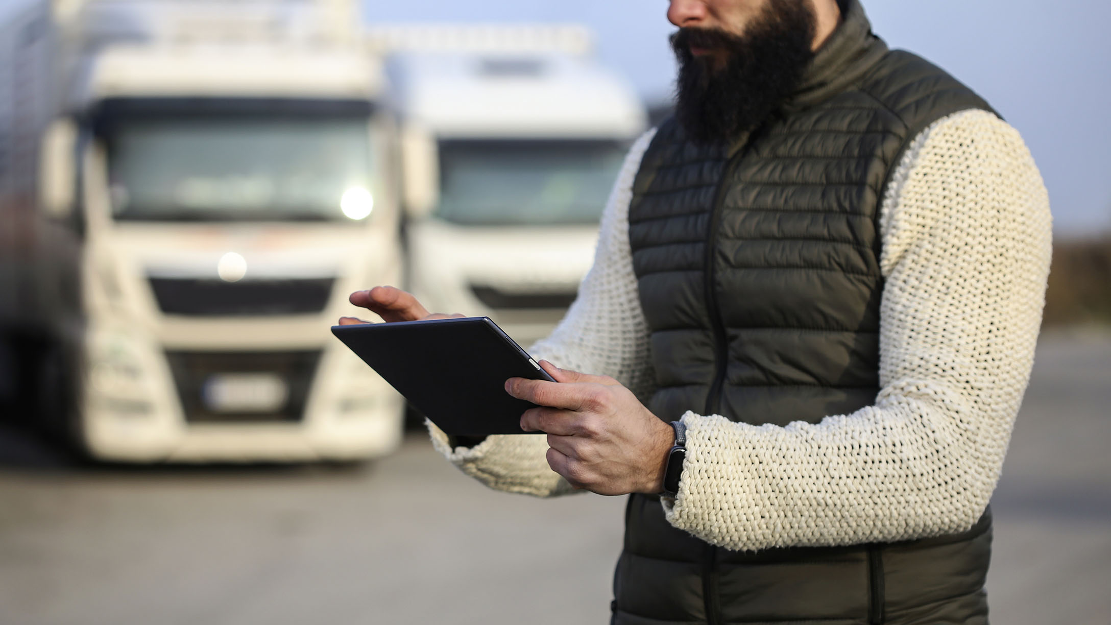 A man looking at a tablet