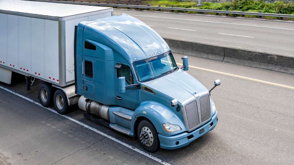 Blue truck on freeway