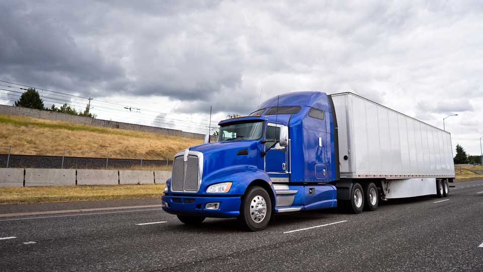 truck driving on road