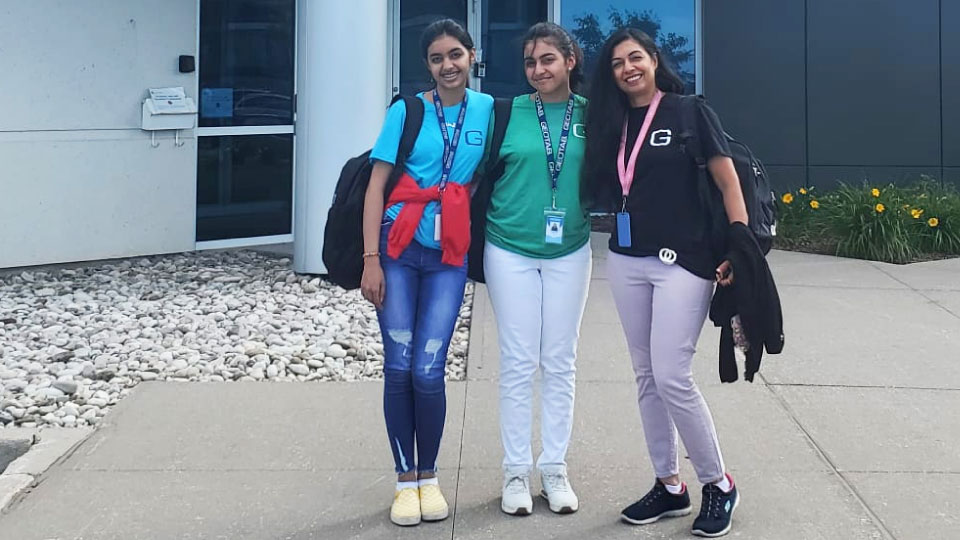 three junior summer geotabbers infront of the Geotab HQ