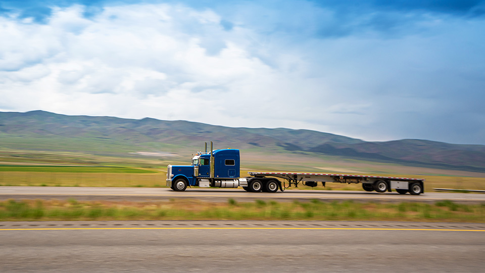 Heavy truck driving on California freeway