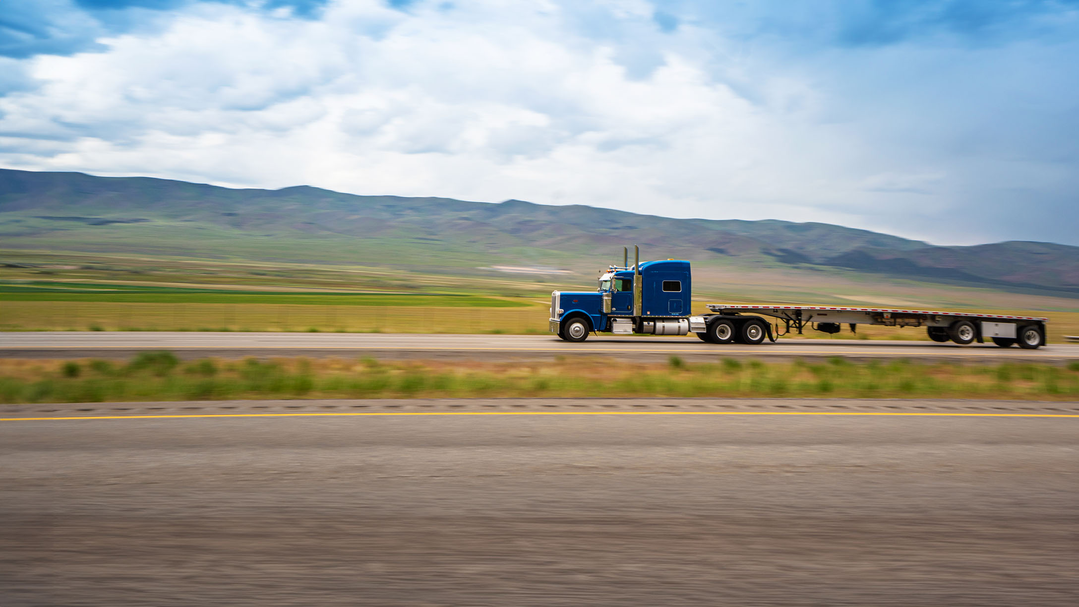 Heavy truck driving on California freeway