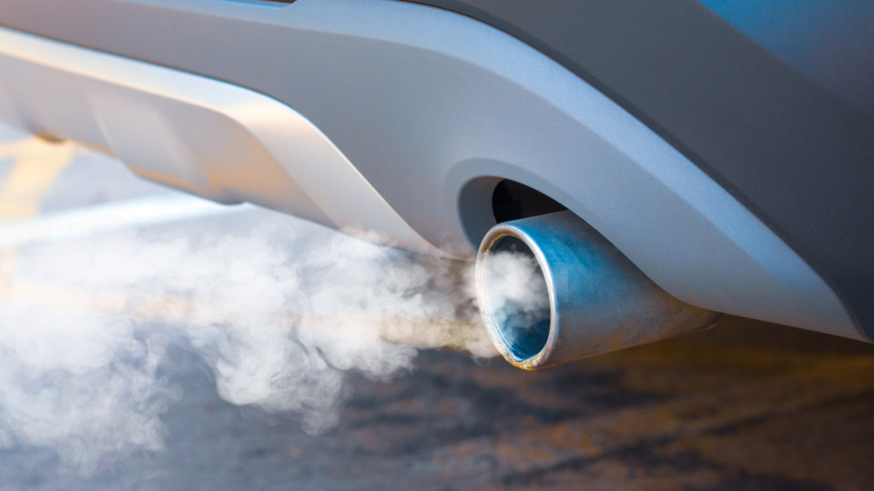 smoke coming out of an exhaust of a vehicle