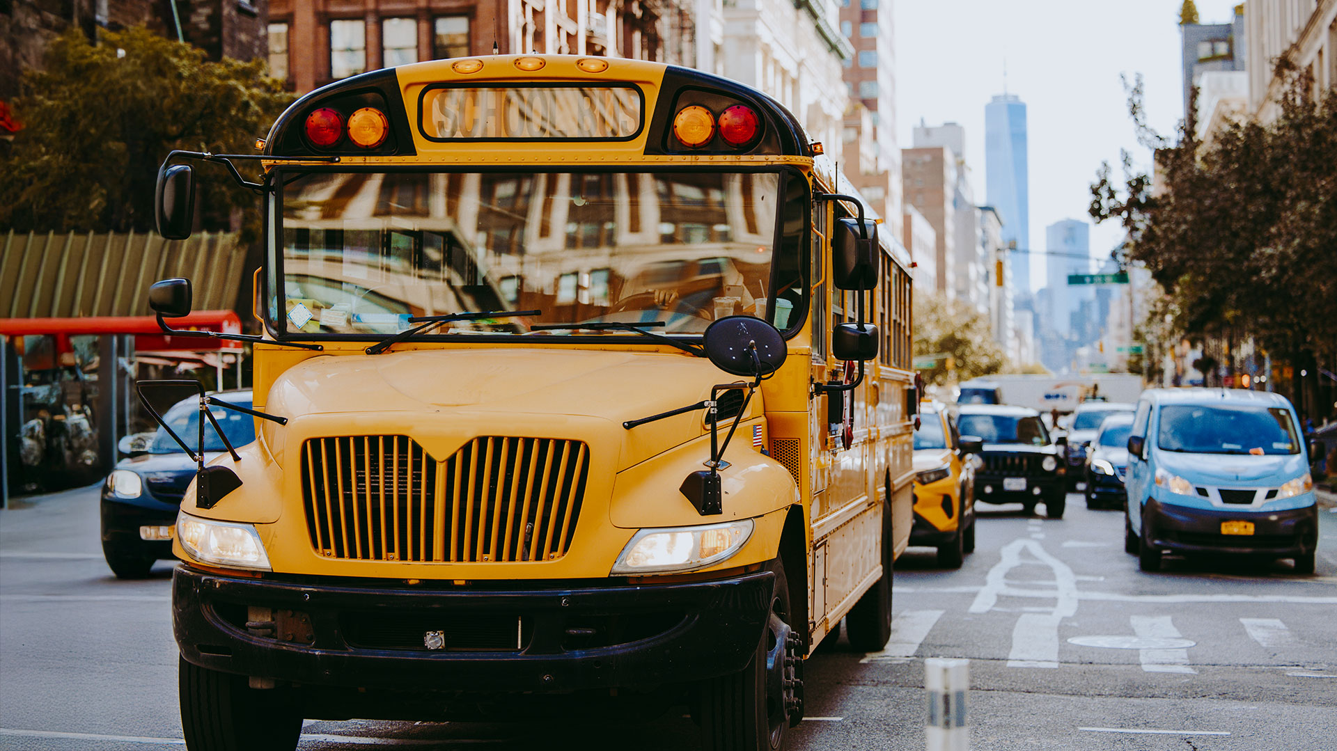school bus driving in the city