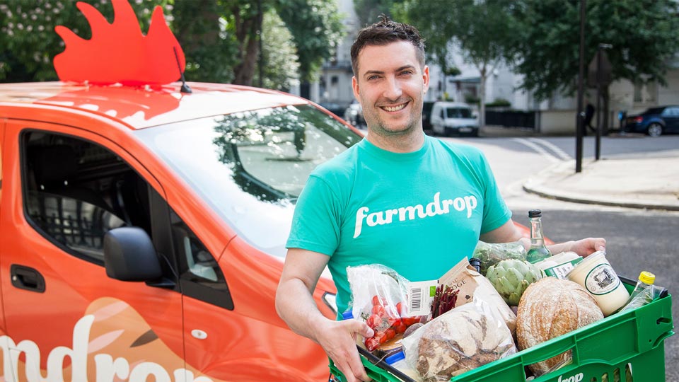 Farmdrop employee delivering groceries