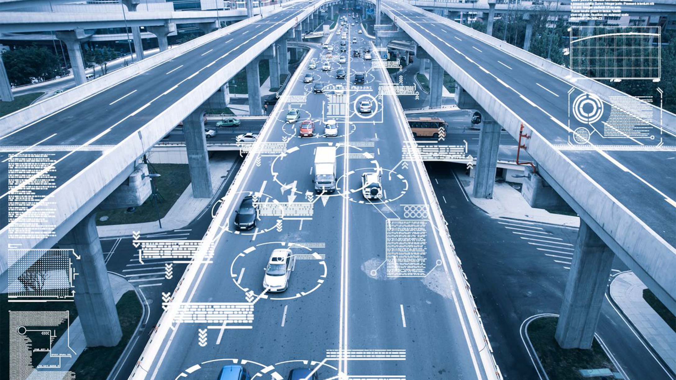Vehicles driving down a busy road with a futuristic vehicle data overlay on top
