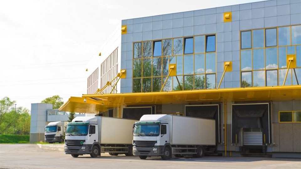 Trucks parked at loading deck