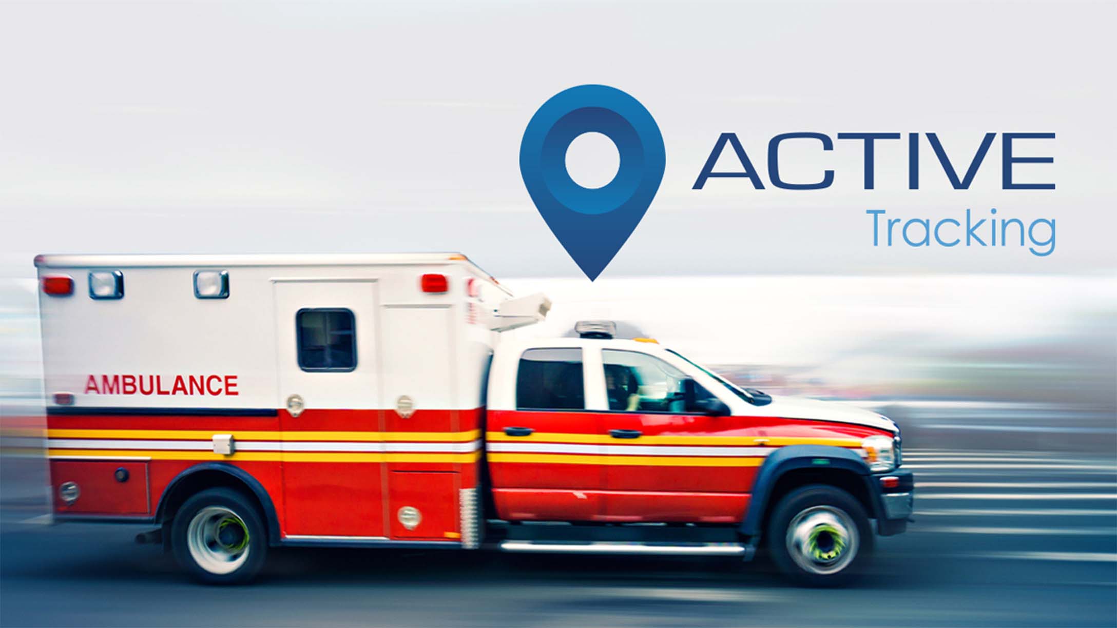 Ambulance driving with Geotab Active Tracking Logo above it