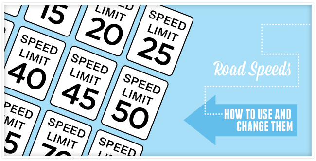 Speed limit signs stacked on top of each other with speeds varying from 15 - 70