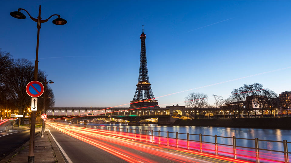 Road with Eiffel tower in the background