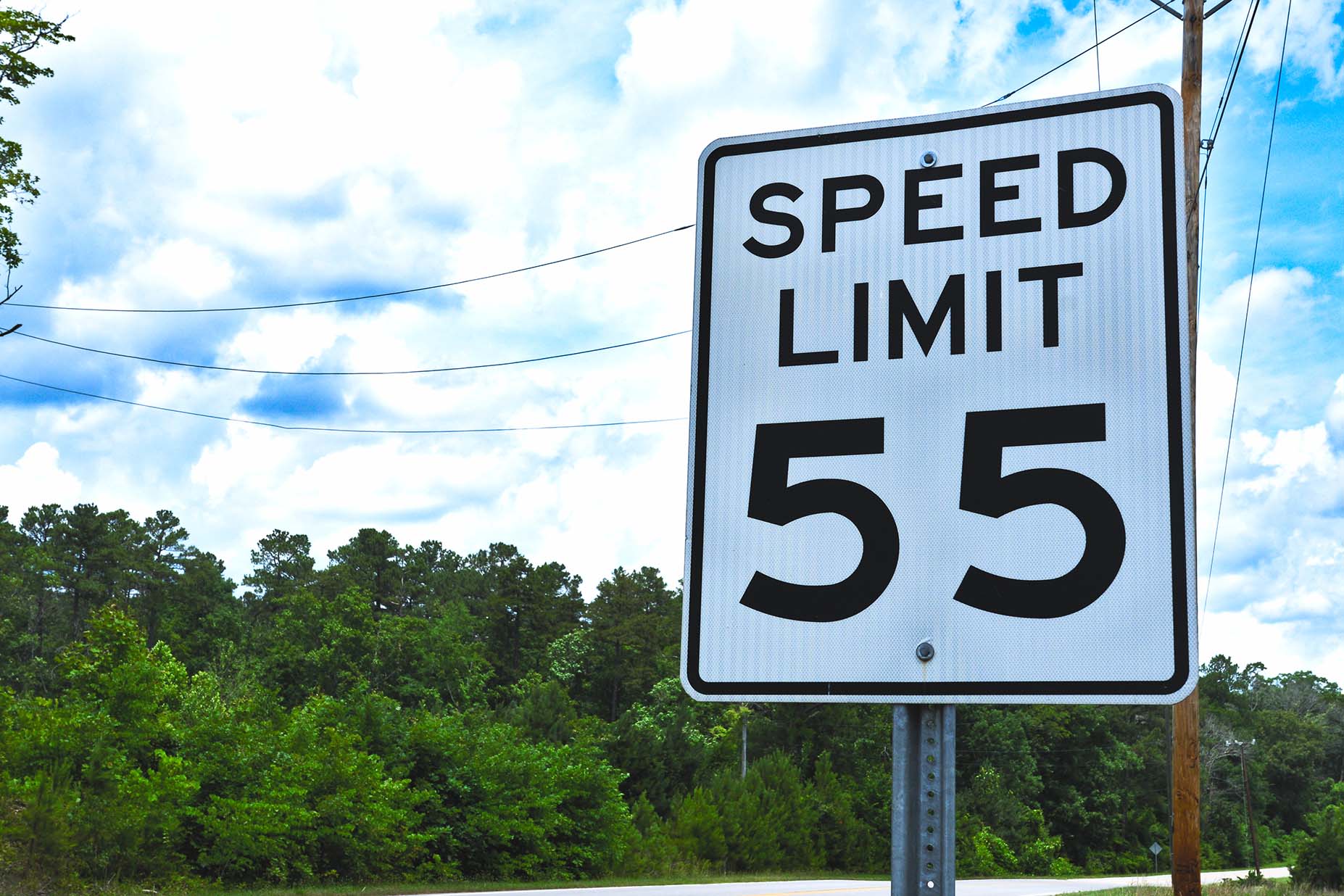 A speed sign saying speed limit 55