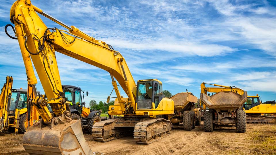 Multiple construction vehicles