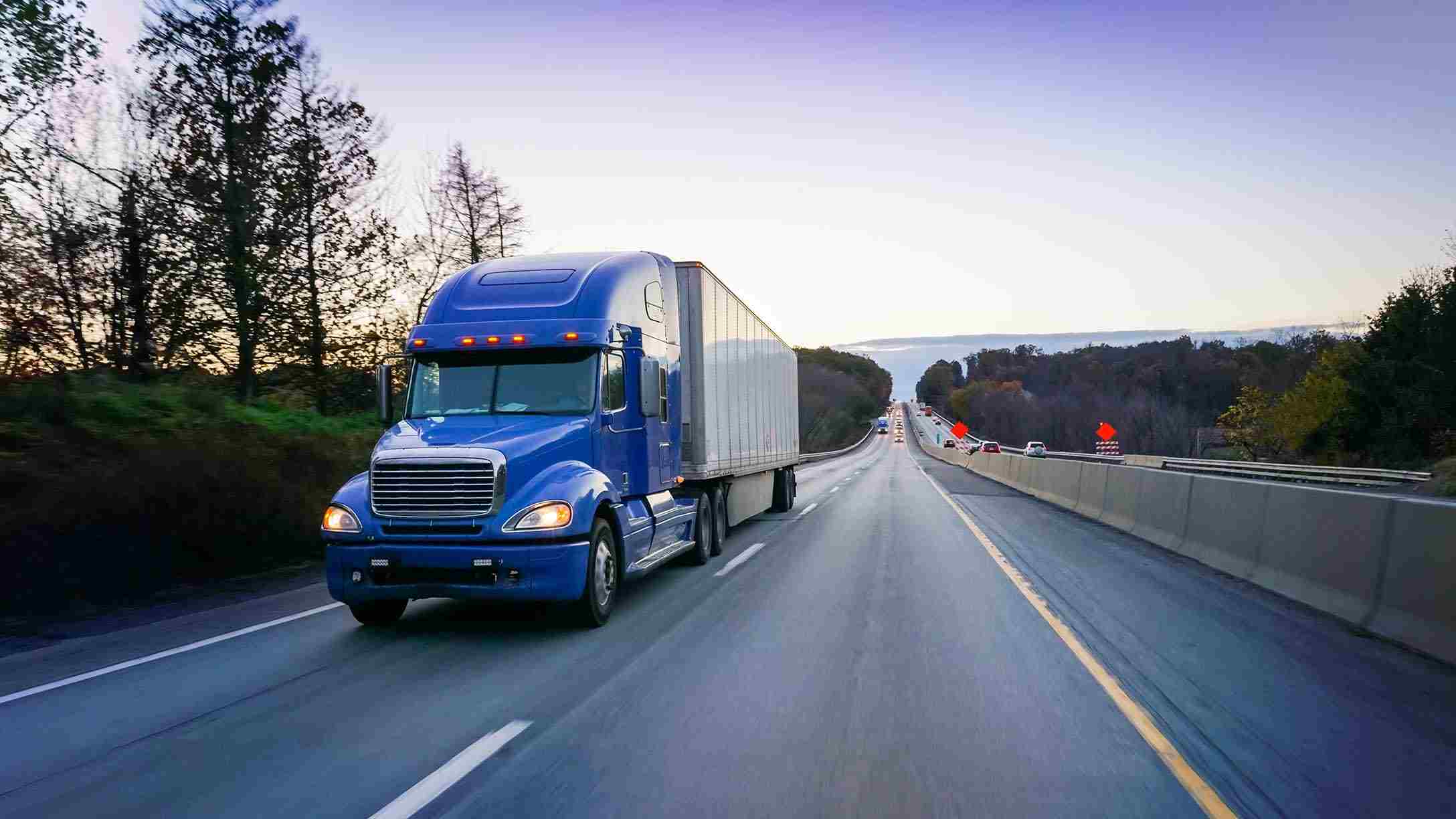 blue truck on the highway