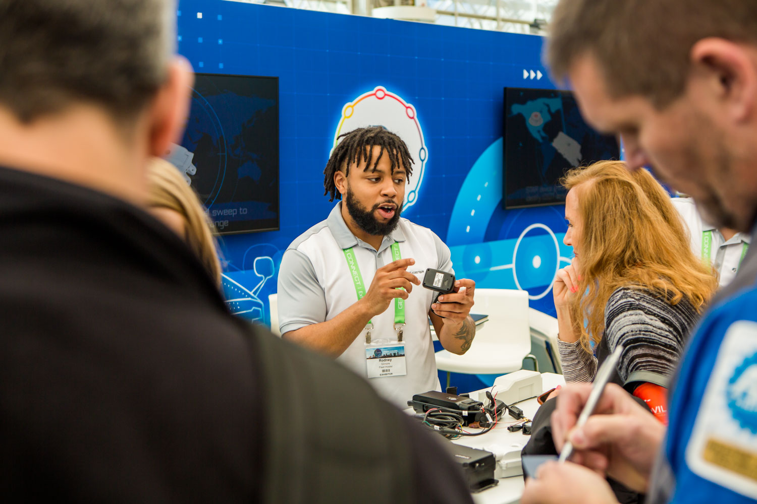 A man talking to a woman in a crowd