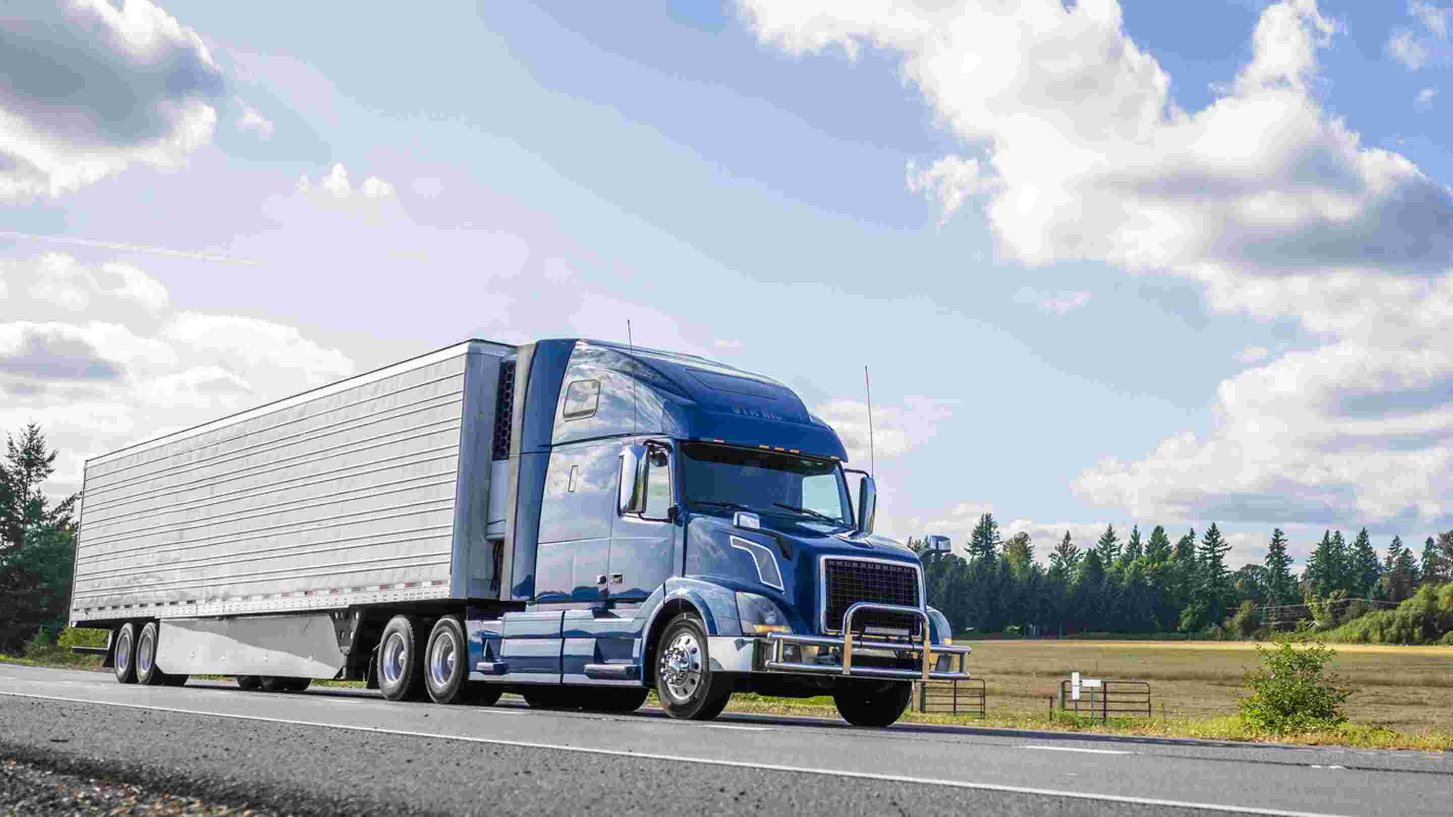 blue truck on the highway