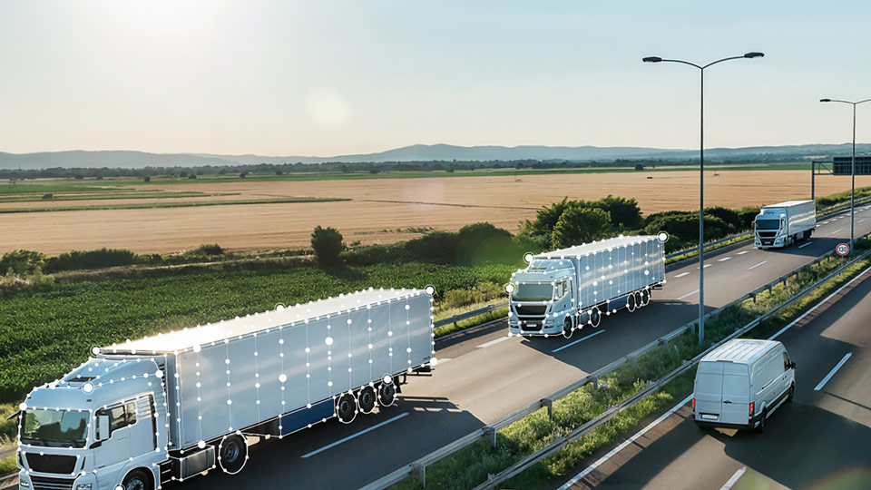 Trucks on the road with data points