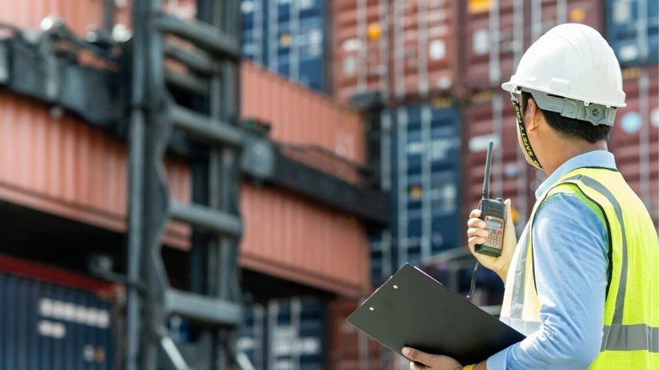 Person looking at cargo in the lot