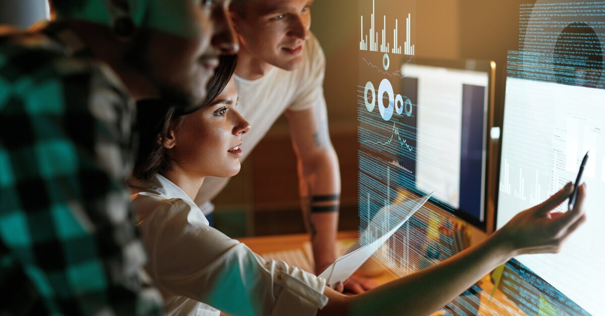 People looking at data on a computer