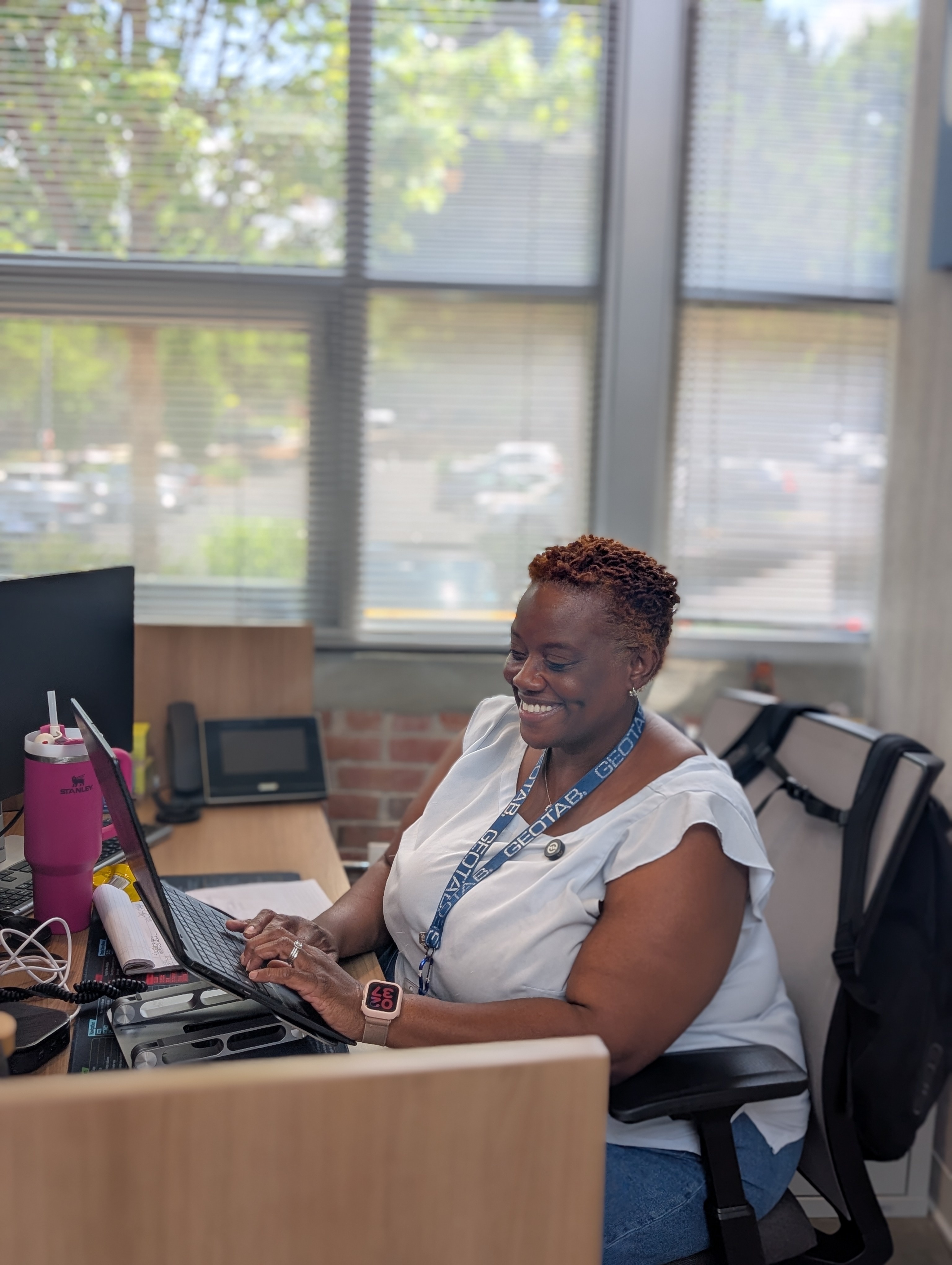 Tracey at her desk