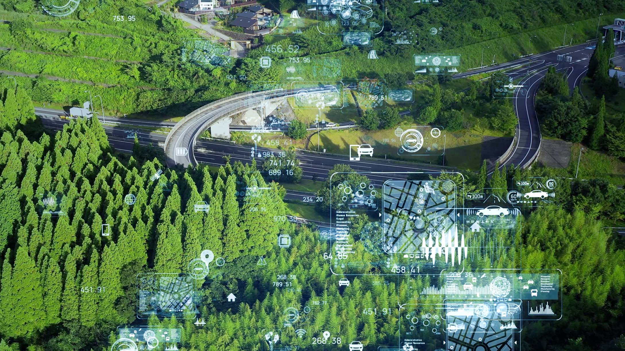 Grüne Landschaft mit futuristischen Symbolen für Fahrzeugdatenpunkte