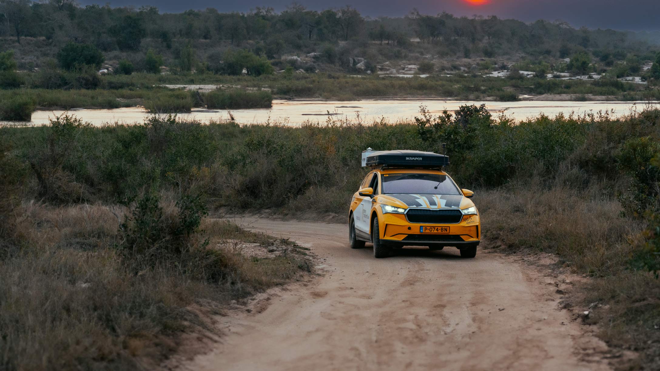 4x4electric vehicle rides a dirt road on epic electric adventure with Geotab