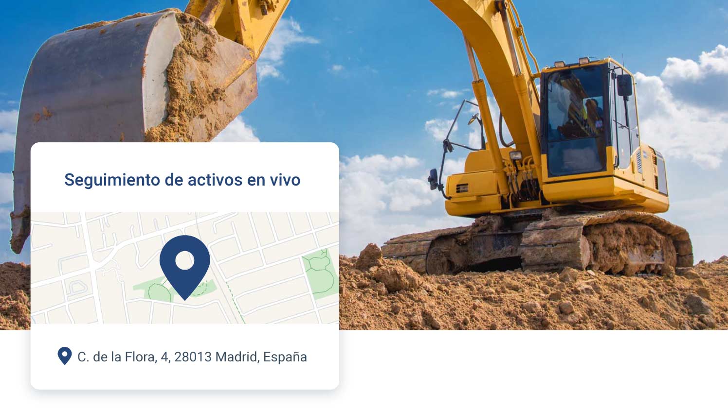 Vehículo de construcción amarillo grande cavando en la tierra con un símbolo de GPS blanco encima 