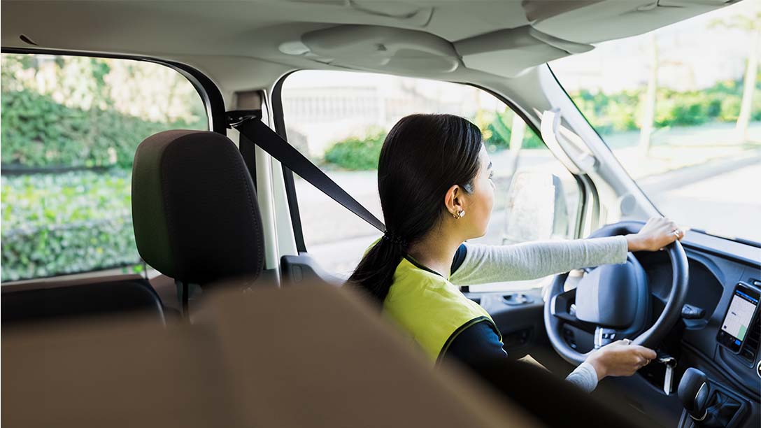 women inside a vehicle driving